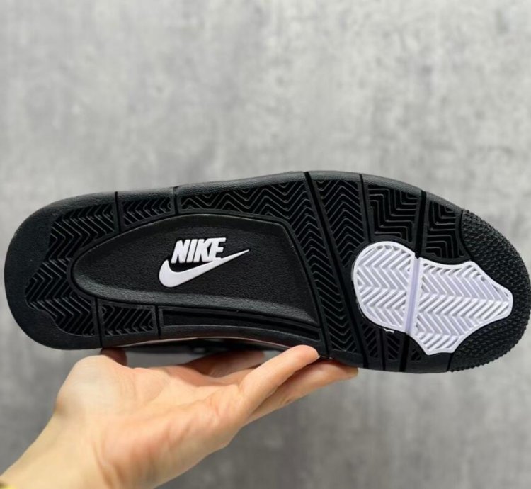 Nigel Sylvester - Jordan 4 Black White