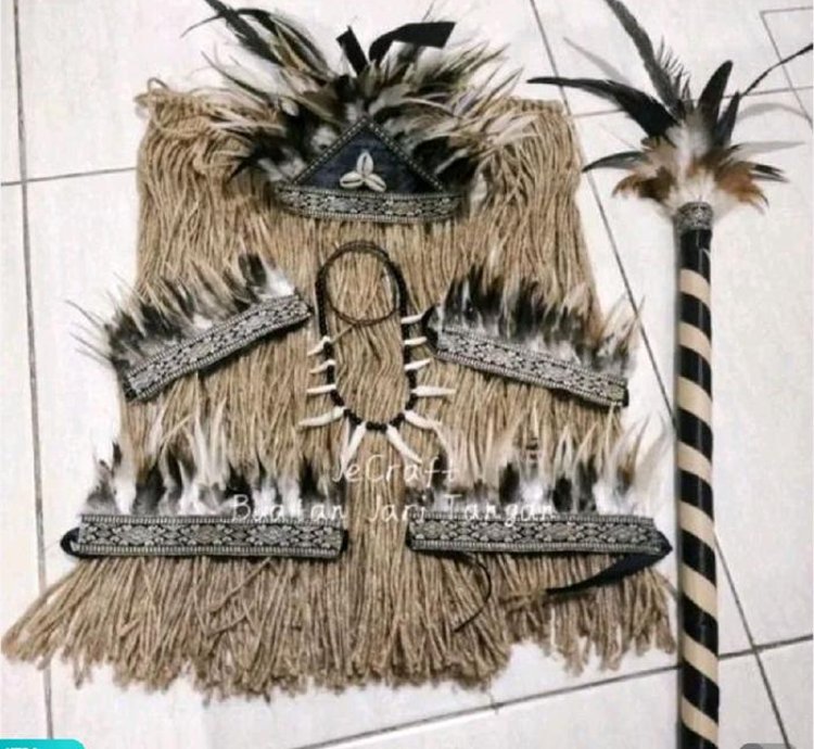 A Set Of Traditional Papuan Interior Costumes With Sticks For Children And Adults